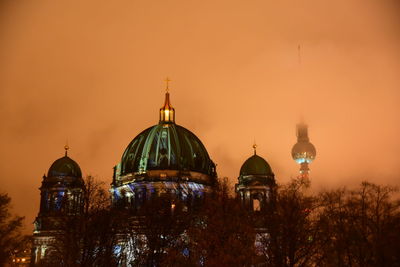 Illuminated cathedral against sky during sunset