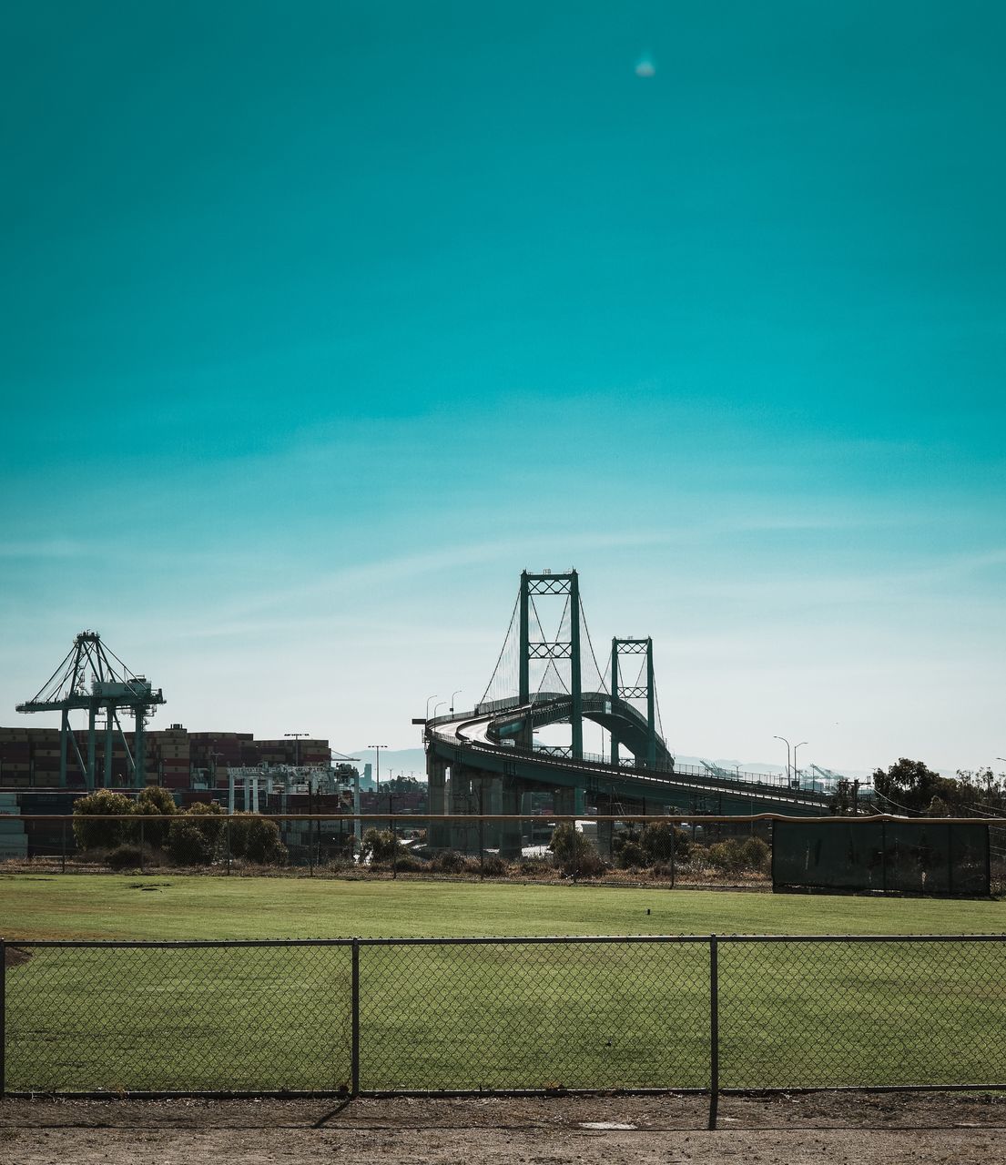 METALLIC STRUCTURE AGAINST CLEAR BLUE SKY