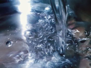 Close-up of ice cubes in water