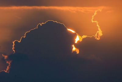 Low angle view of dramatic sky during sunset