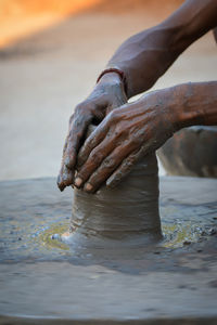 Person working in mud