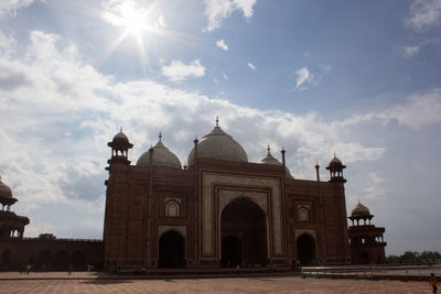 View of historical building against cloudy sky