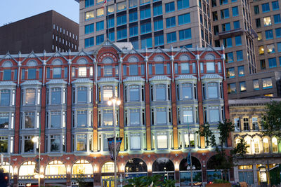 Buildings in city at night