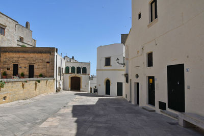The town square of specchia, a medieval village in the puglia region of italy.