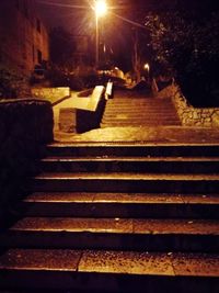 View of stairs at night