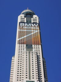 Low angle view of skyscraper against clear sky