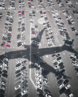 High angle view of traffic on street amidst buildings in city