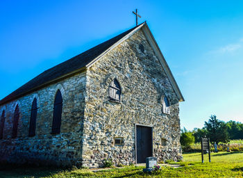 Exterior of house against clear blue sky