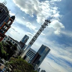 Low angle view of skyscrapers against sky