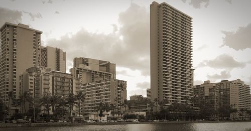 Modern buildings in city against sky