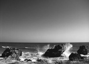 Scenic view of sea against clear sky