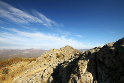 Panoramic view of rocky mountains against sky