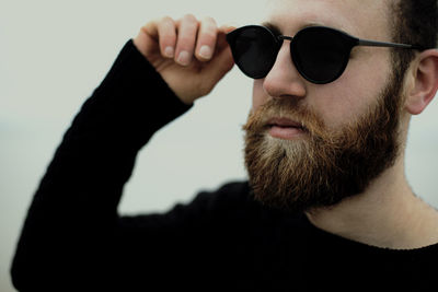 Close-up of young man wearing sunglasses