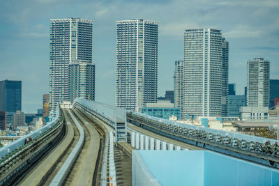 High angle view of modern buildings against sky