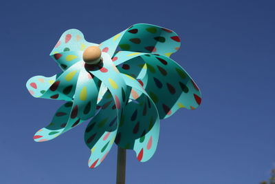 Close-up of pinwheel against clear blue sky
