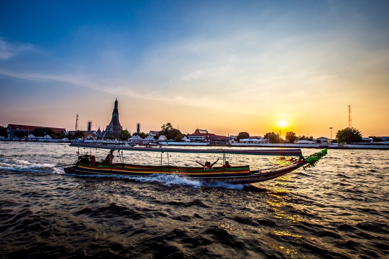 sunset, water, nautical vessel, transportation, sea, sky, waterfront, mode of transport, sun, boat, orange color, scenics, built structure, rippled, beauty in nature, nature, sunlight, travel, cloud - sky, tranquil scene