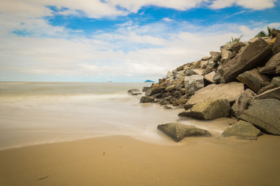 Scenic view of beach against sky