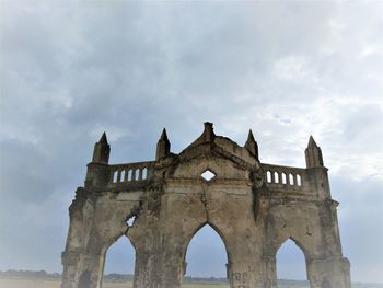 Low angle view of historic building against sky