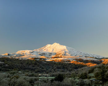 A snow covered portrait of moel siabod in snowdonia national park, north wales