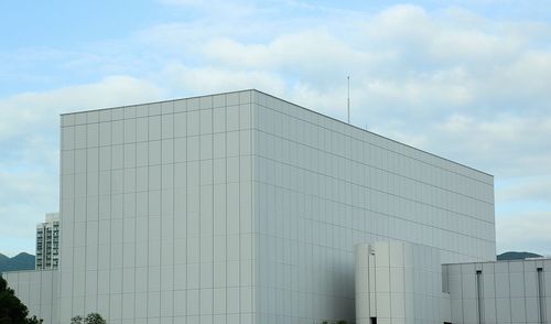 Low angle view of modern building against sky