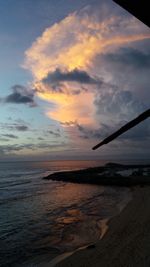 Scenic view of sea against sky at sunset