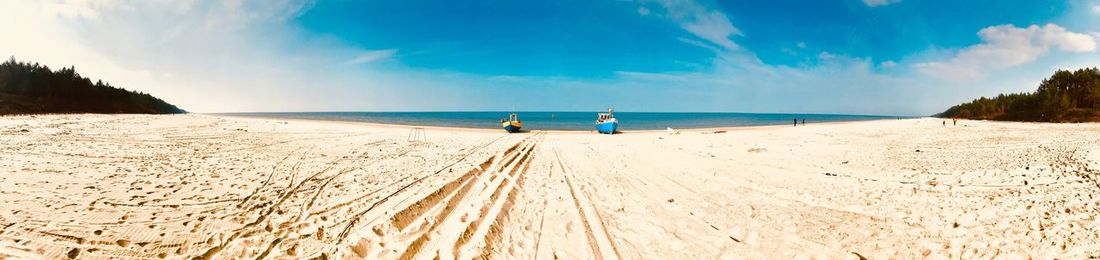 Panoramic view of beach against sky