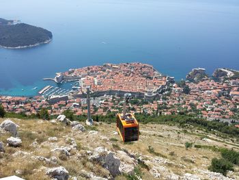 High angle view of town by sea