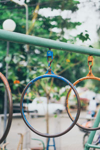 Close-up of bicycle on metal grate