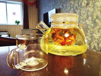 Close-up of drink in jar on table