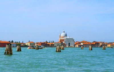 Panoramic view of sea against blue sky