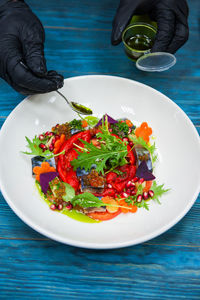 High angle view of salad in plate on table