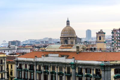 View of ancient church against cloudy sky