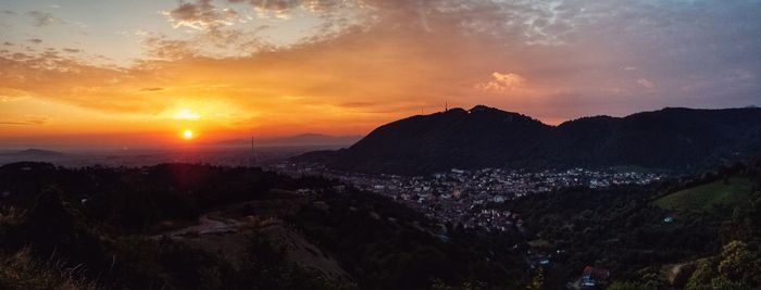 Scenic view of landscape against sky during sunset