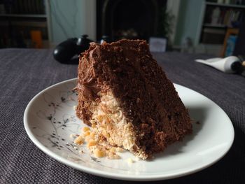 Close-up of chocolate cake in plate on table