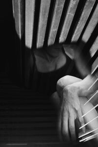 Double exposure of woman and fence