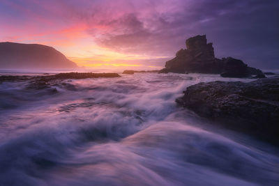 Scenic view of sea against sky during sunset