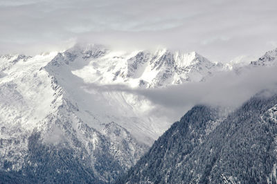 Scenic view of snowcapped mountains during winter