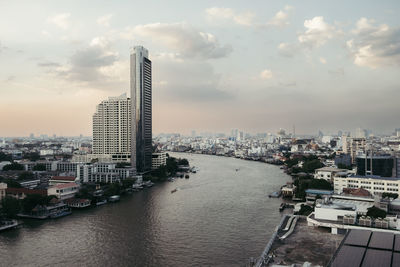 High angle view of city at sunset