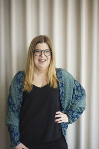 Smiling businesswoman looking at camera