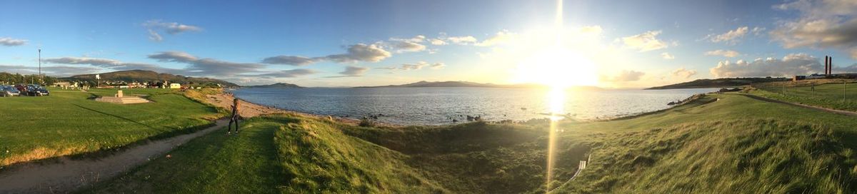 Panoramic view of sea against sky during sunset