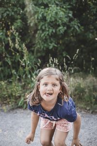 Portrait of a girl standing outdoors