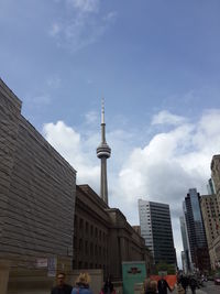 Low angle view of buildings in city against sky