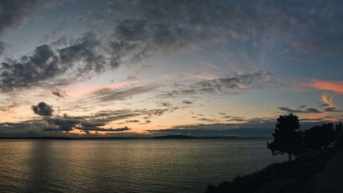 Scenic view of sea at sunset