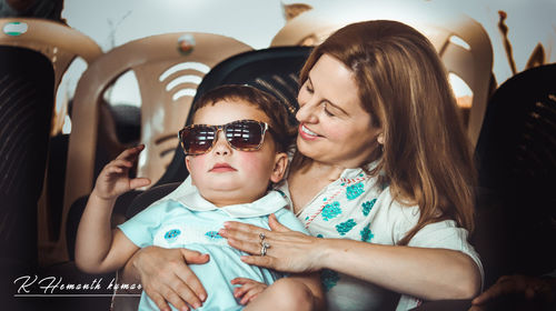 Portrait of women sitting in car