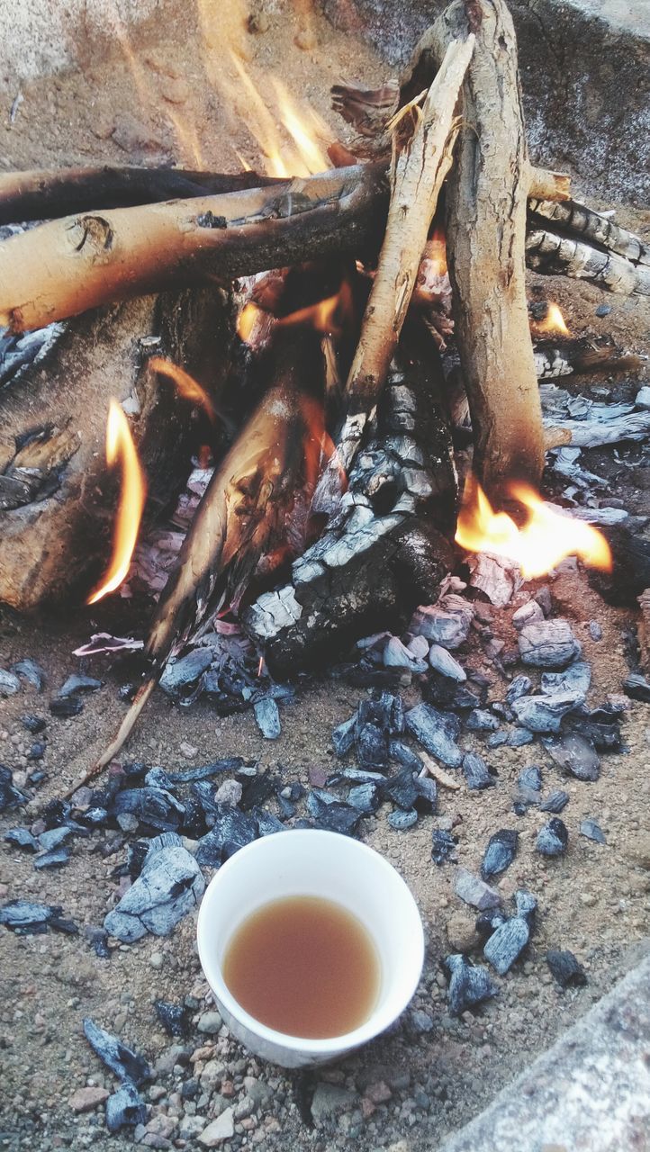 food and drink, drink, coffee cup, freshness, coffee - drink, refreshment, indoors, table, high angle view, still life, close-up, heat - temperature, saucer, spoon, healthy eating, cup, no people, directly above, coffee, wood - material