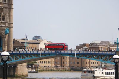 View of buildings in city against clear sky