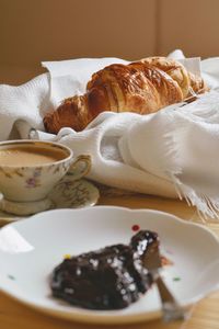 Close-up of breakfast served on table