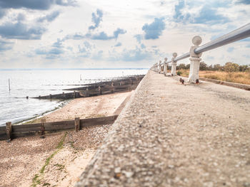 Low angle view along promenade and beach at shoeburyness seafront