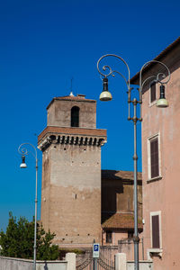 The famous borgia tower against a beautiful blue sky in rome