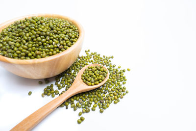 Green beans against white background